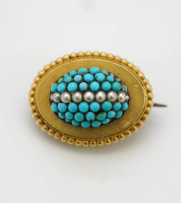 A Victorian yellow metal, turquoise and seed pearl set domed cluster mourning brooch, with plaited hair verso, 22mm. Condition - poor to fair